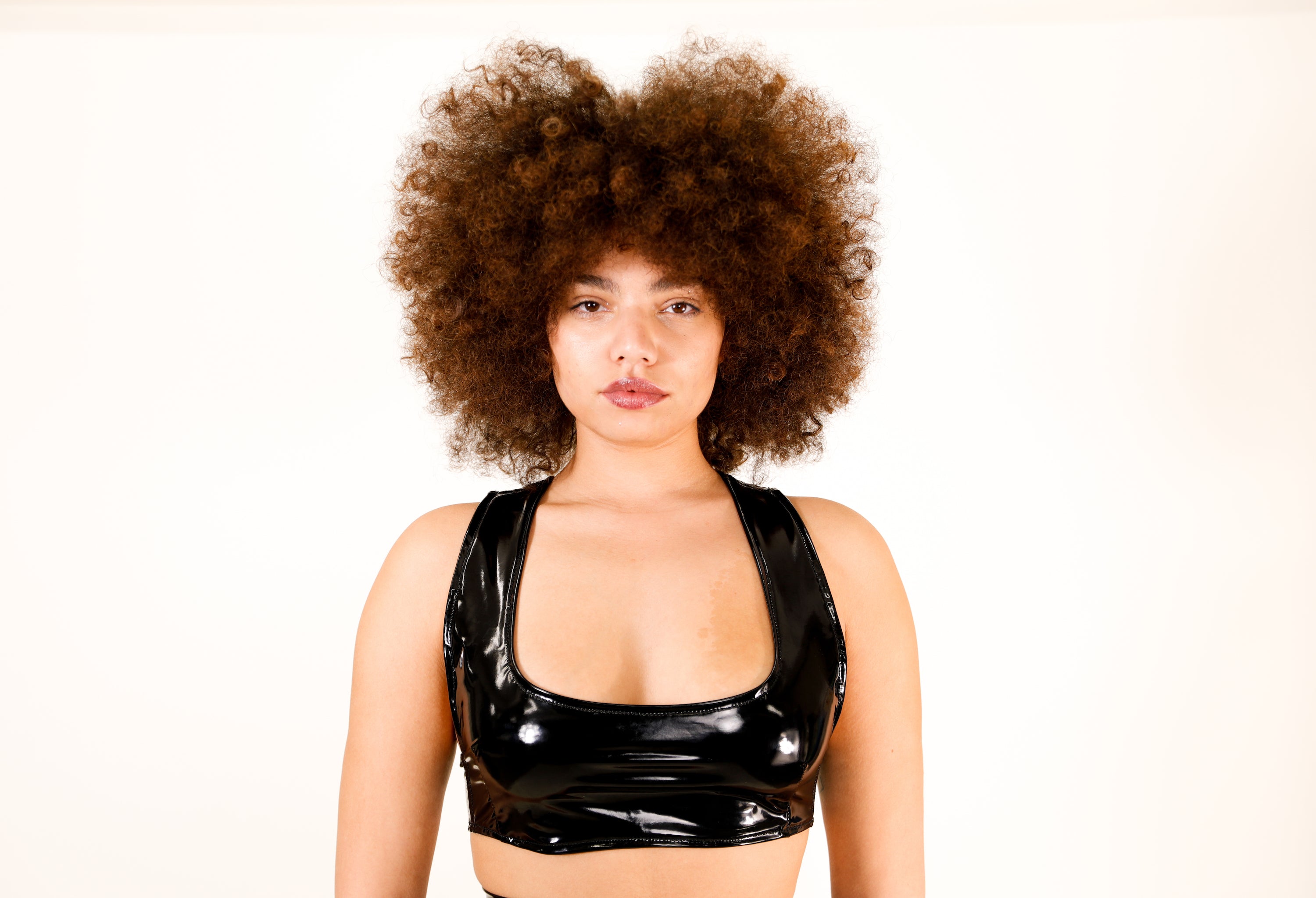 Model wears medium Latex Top by GrayScale (Close up)