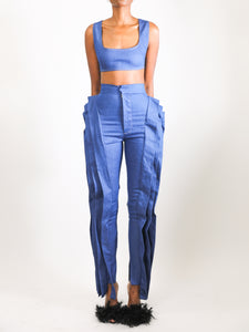 Model wears small Denim Pleat Pants by GrayScale (Front)