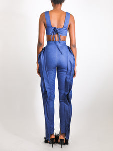 Model wears small Denim Pleat Pants by GrayScale (Back)