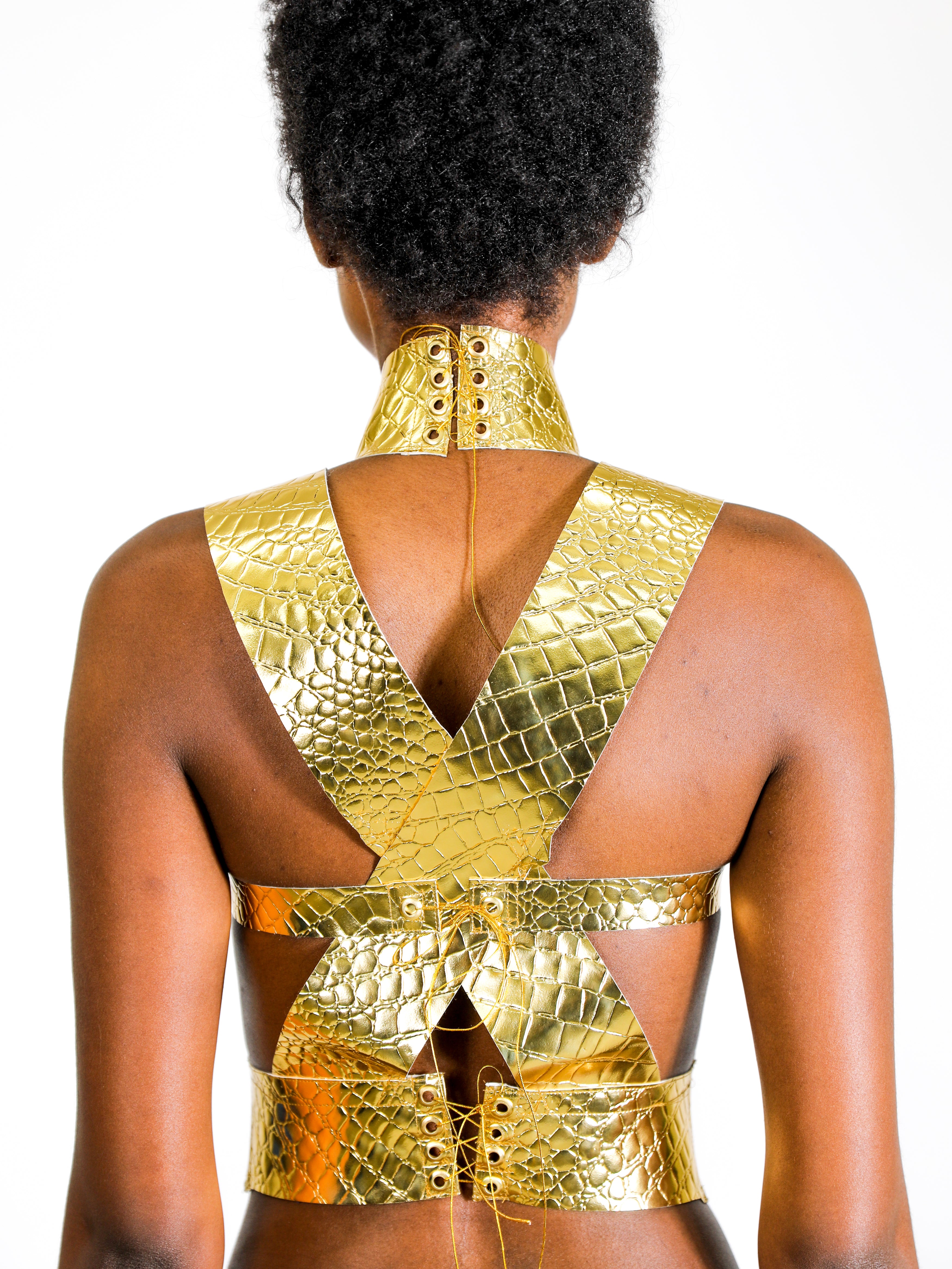 Model wears small Criss Cross Croc Top - Gold by GrayScale (Back)