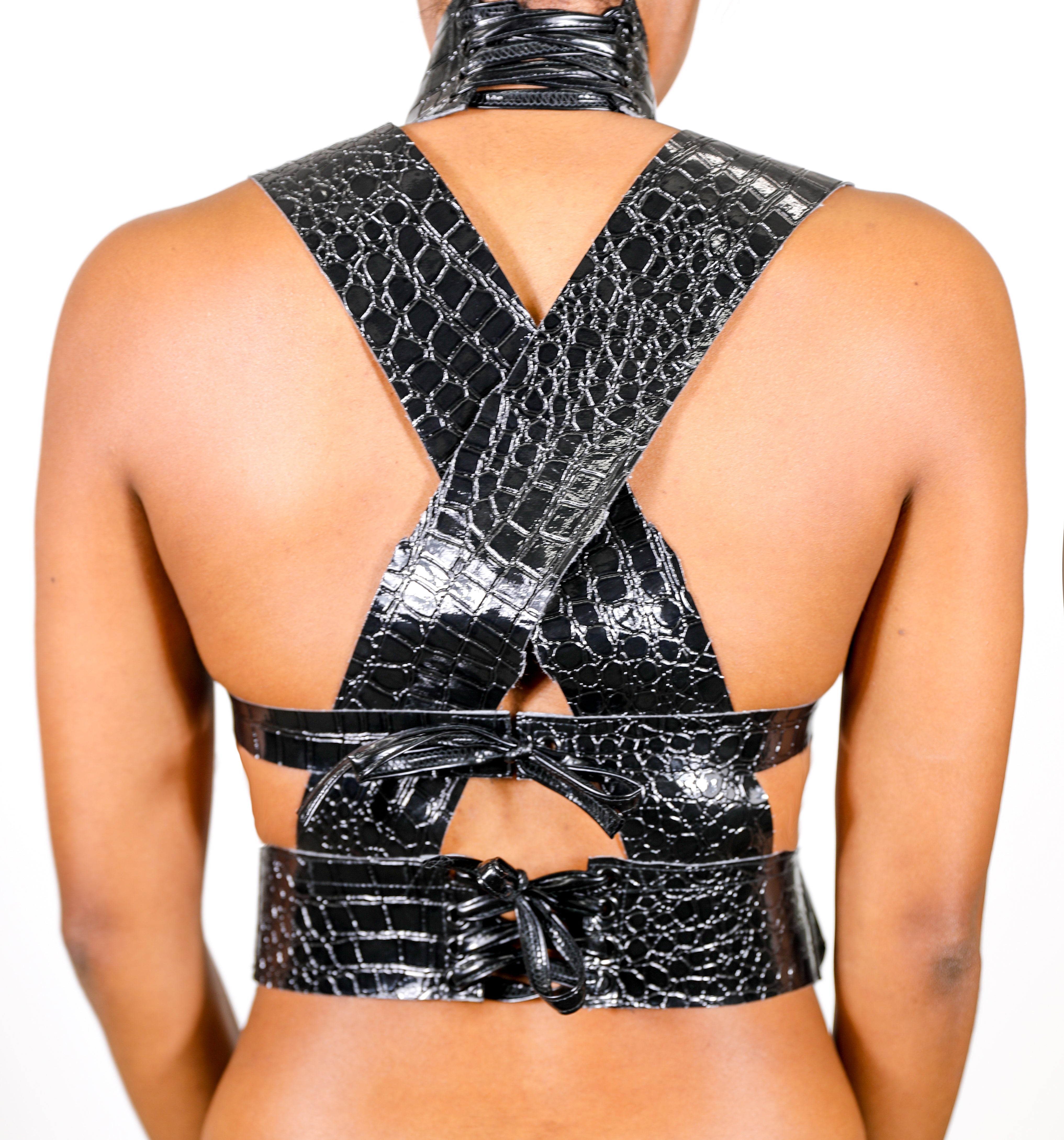 Model wears small Criss Cross Croc Top - Black by GrayScale (Back)